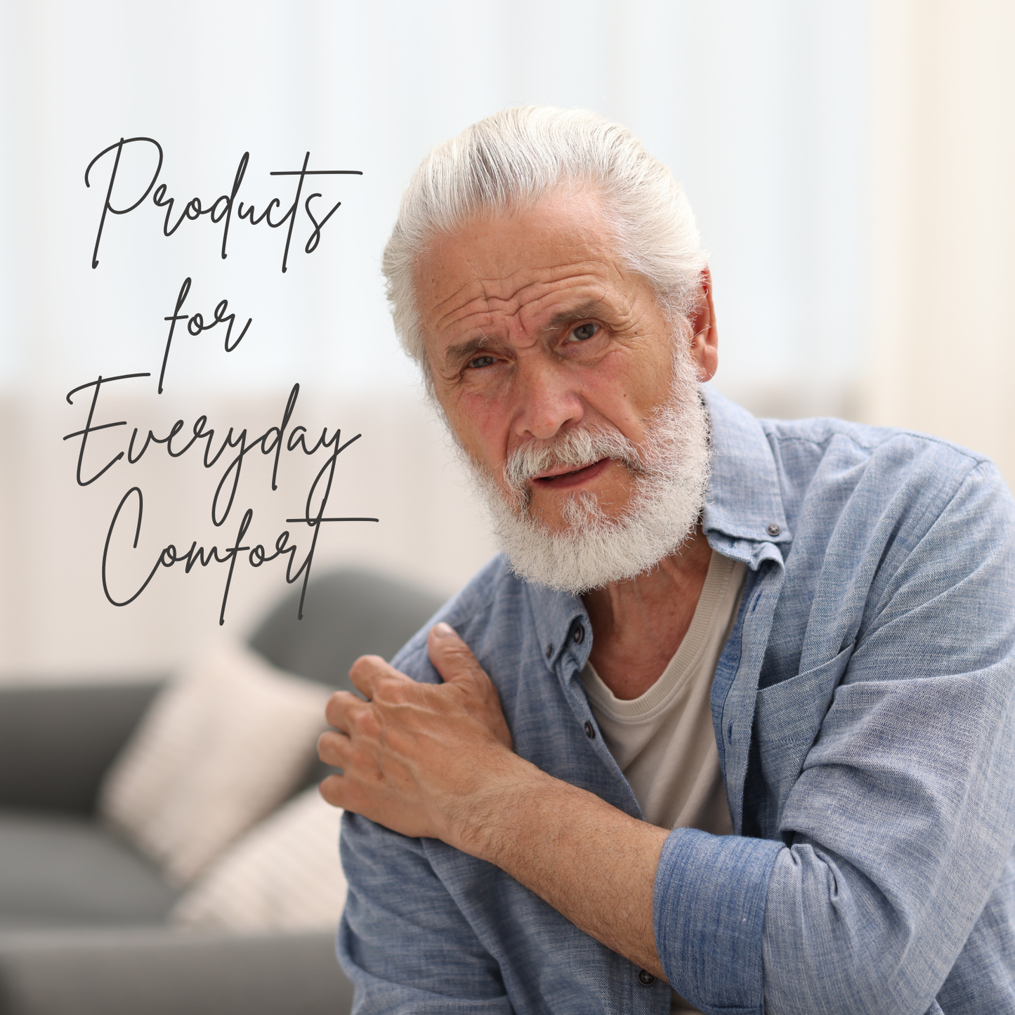 Man with white hair and beard wearing a blue shirt, with text 'Products for Everyday Comfort' on a blurred background.